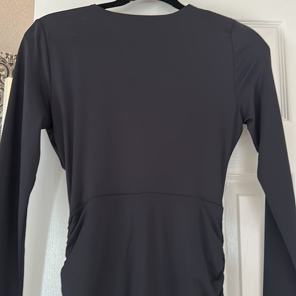 Zara black dress long sleeve with a triangle opening on the front at waist. - Picture 7 of 7